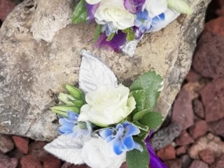 Whie roses with purple accents - prom and homecoming