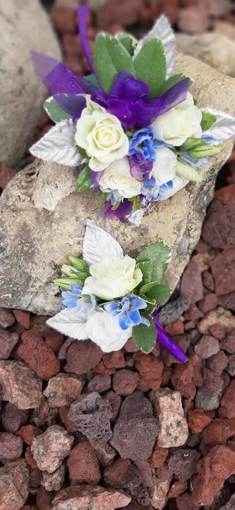 Whie roses with purple accents - prom and homecoming