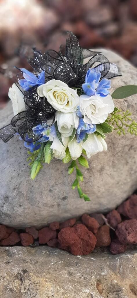 Whie roses with blue accents - prom and homecoming