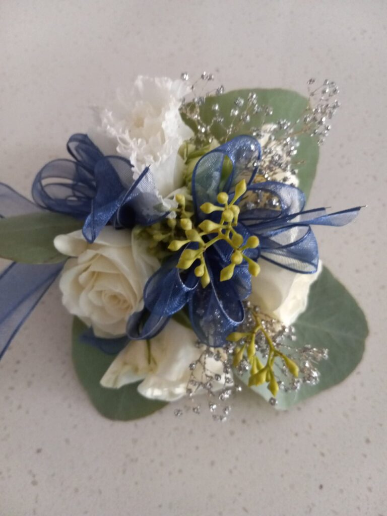 White Roses with blue accent - prom and homecoming
